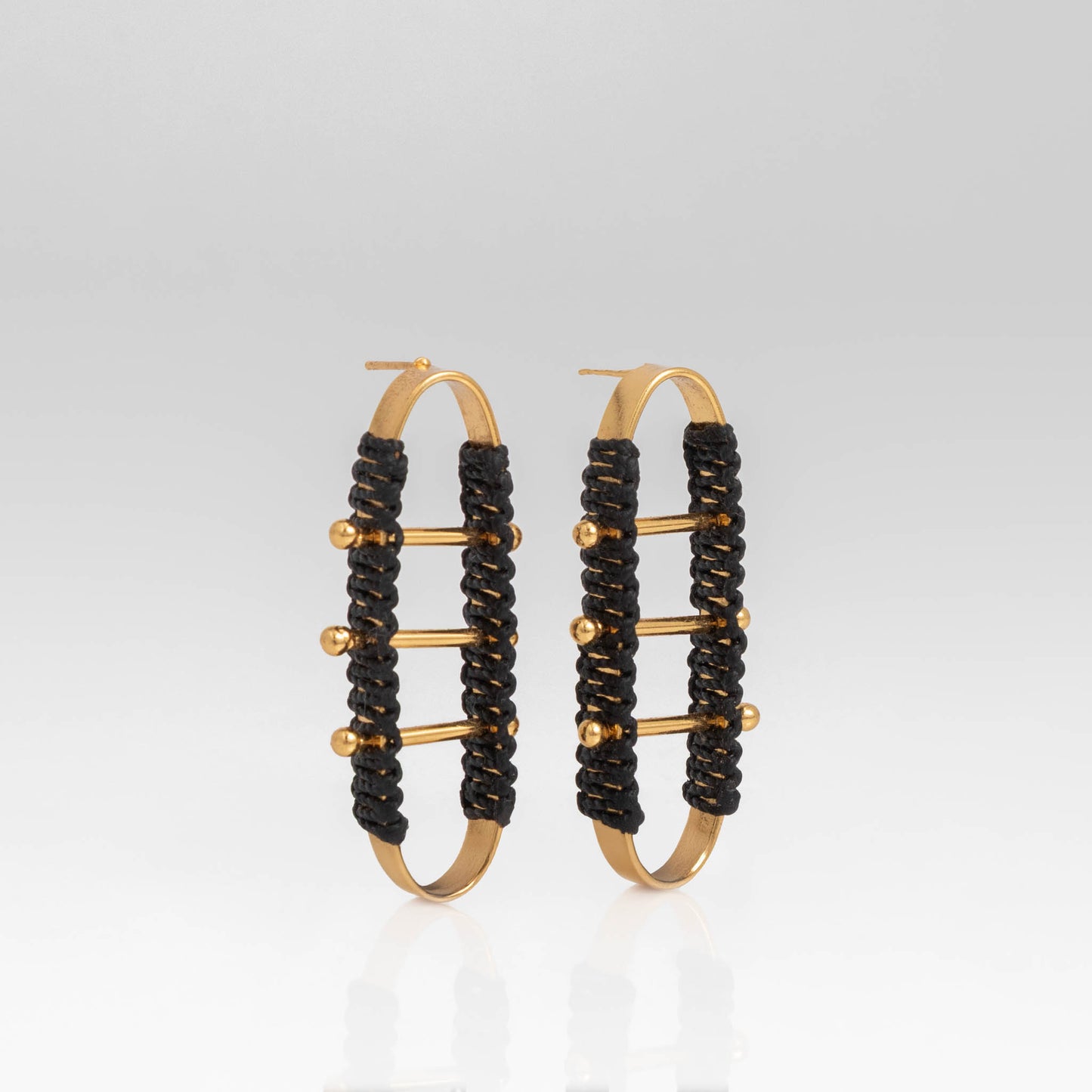 Aretes Clavija